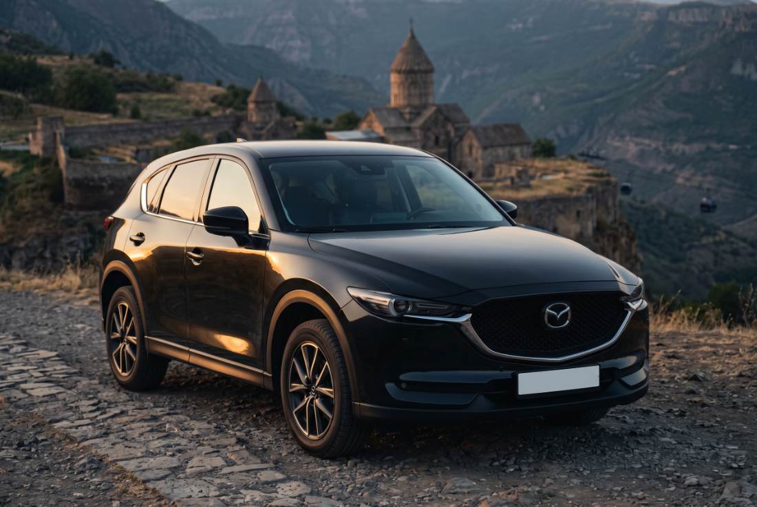 Mazda CX-5, three-quarter front, on a gravel road