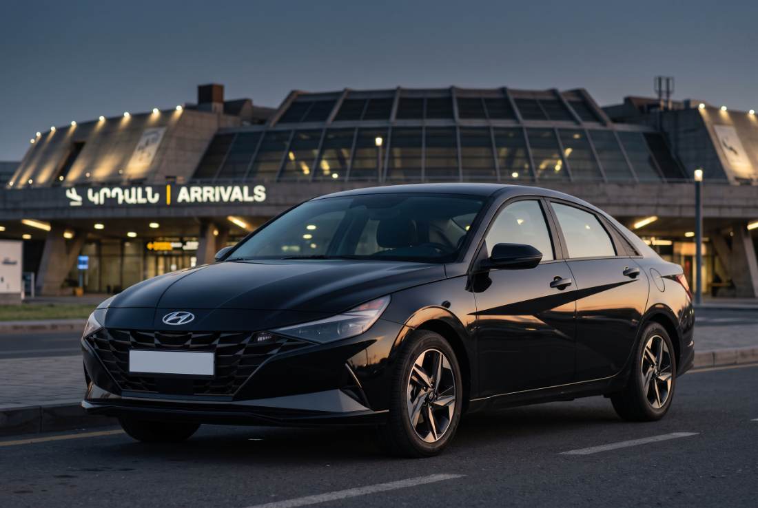 Hyundai Elantra, black, three-quarter front, daylight