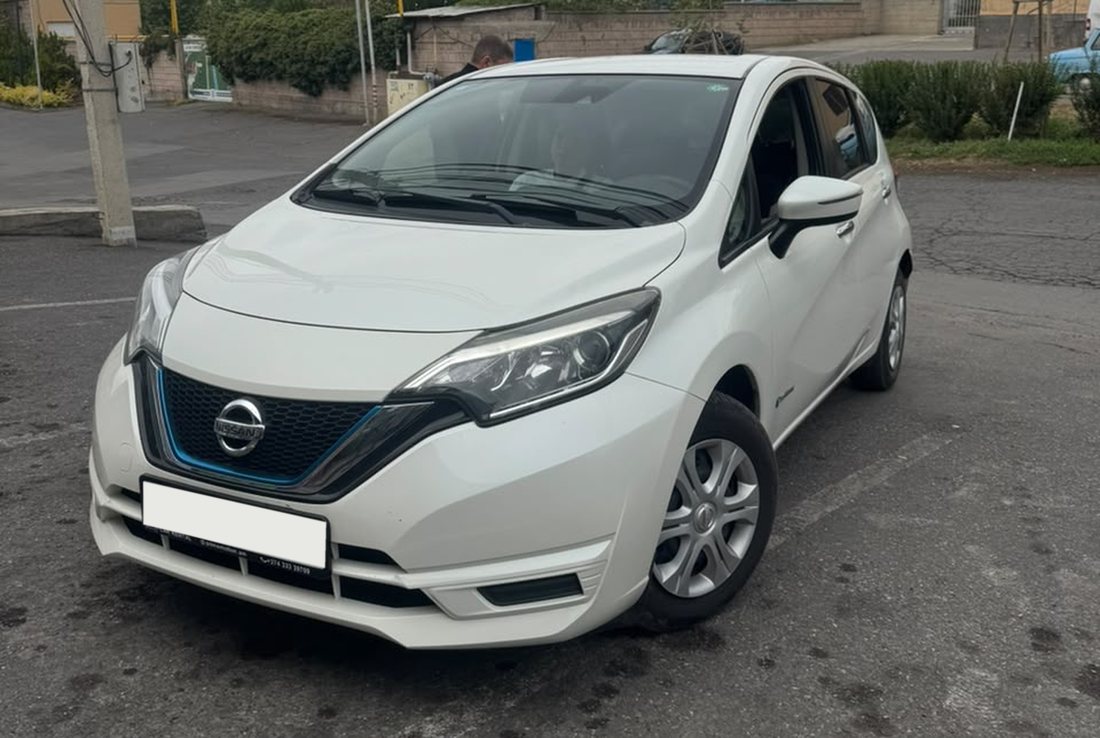 Nissan Note e-POWER, white, three-quarter front, daylight